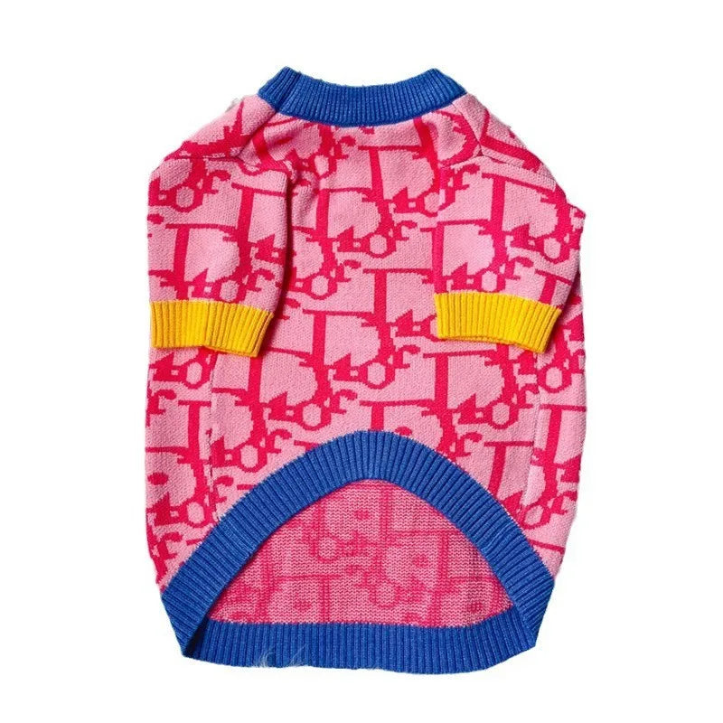 Stylish pink dog sweater for small dogs with colorful pattern and ribbed edges