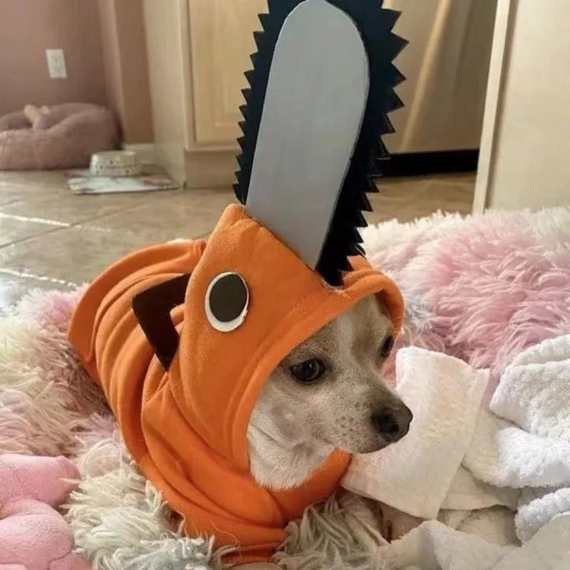 Cute dog wearing a Pochita pet outfit for dogs with a hood and saw design