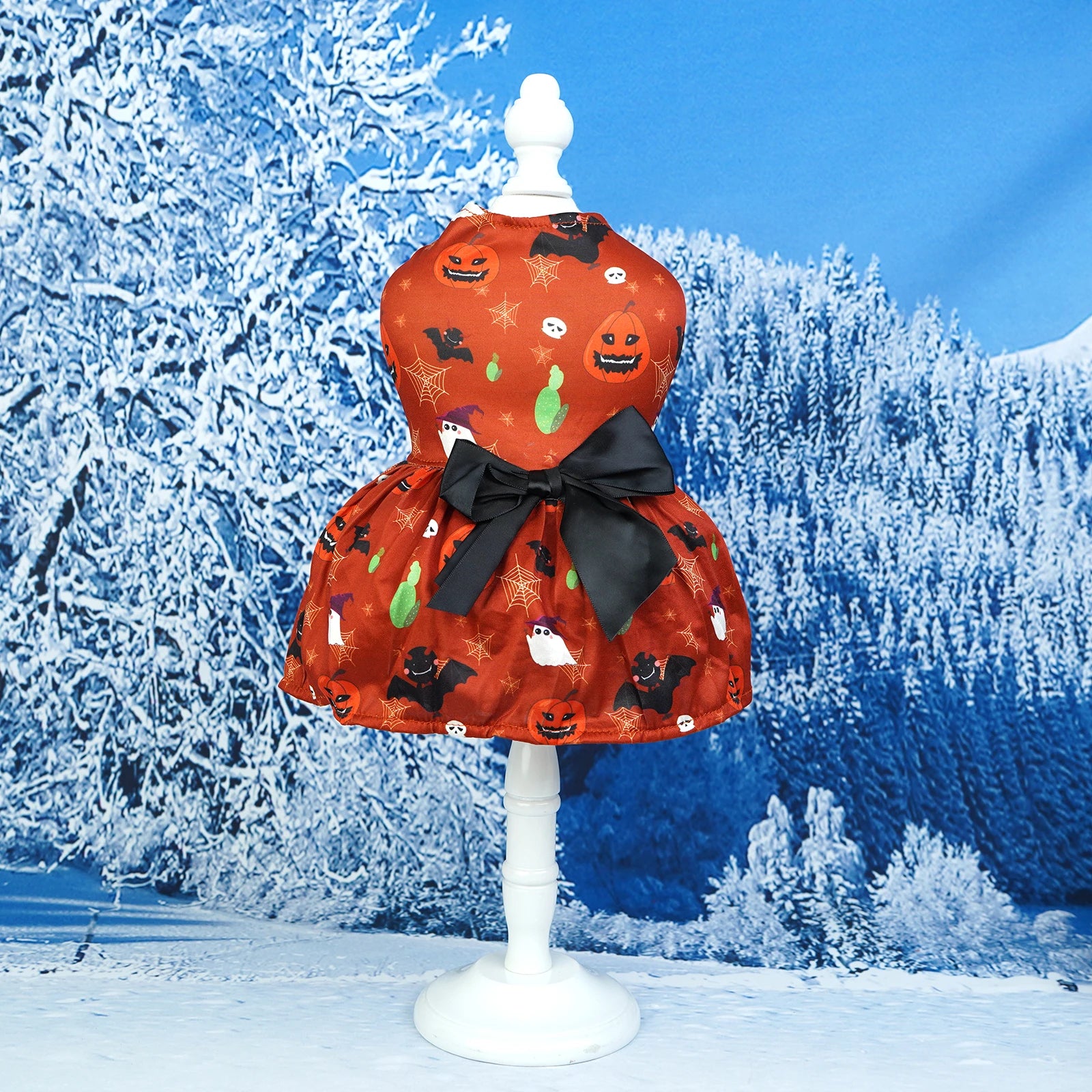 Pumpkin pet skirt for dogs featuring Halloween-themed design with a black bow