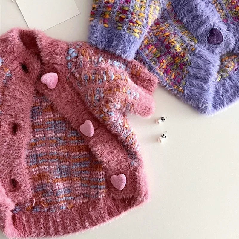 Colorful puppy knitted coat for winter featuring soft textures and fun heart-shaped buttons