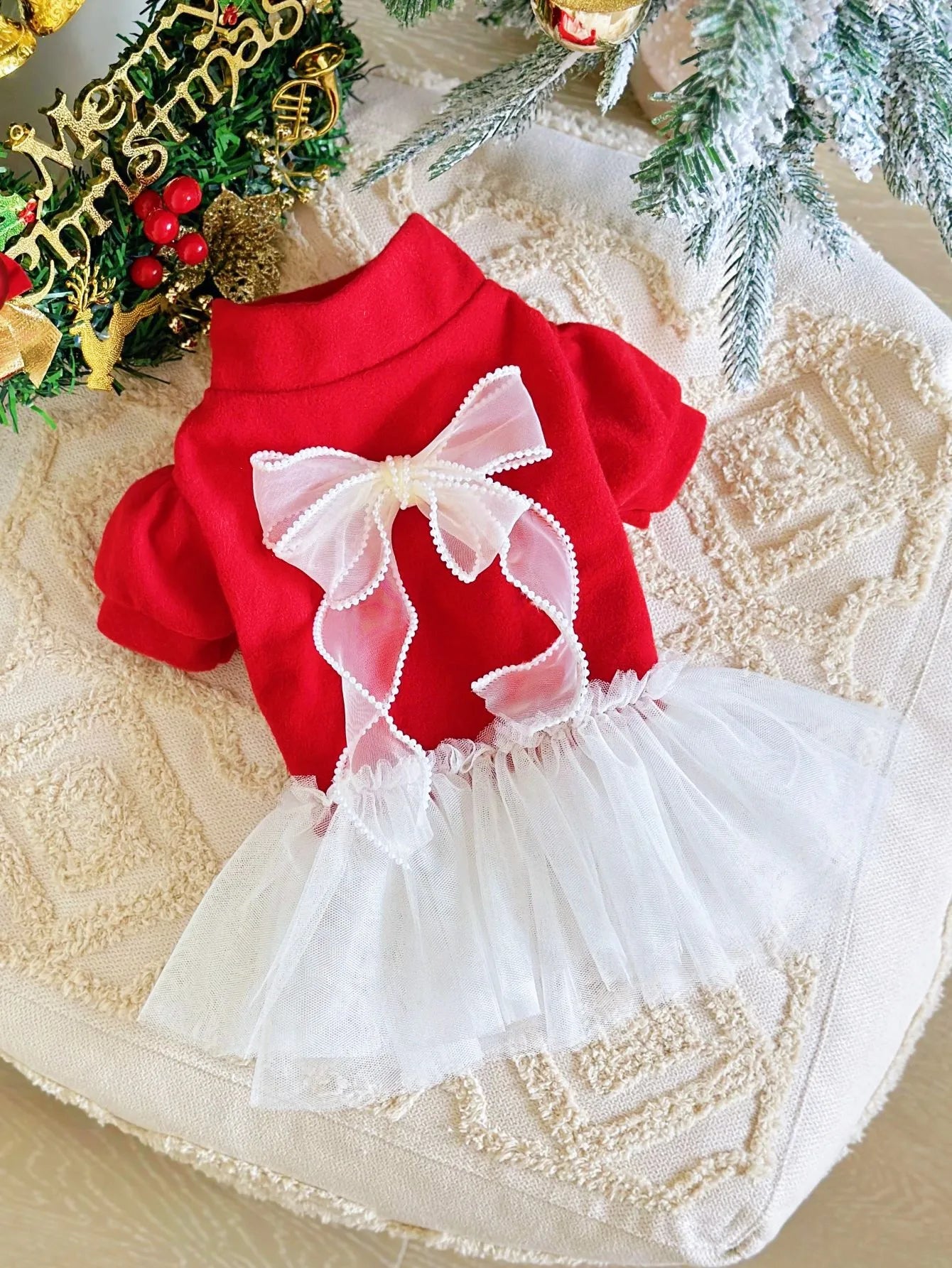 Cute red tweed dog dress with lace and bow detail, perfect for festive occasions