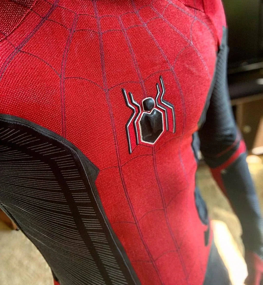 Detailed Far From Home Spiderman costume featuring red and black design with spider emblem