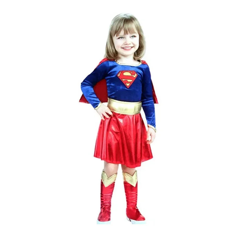 Adorable girl wearing a Supergirl Halloween Costume with a blue top, red skirt, and red cape