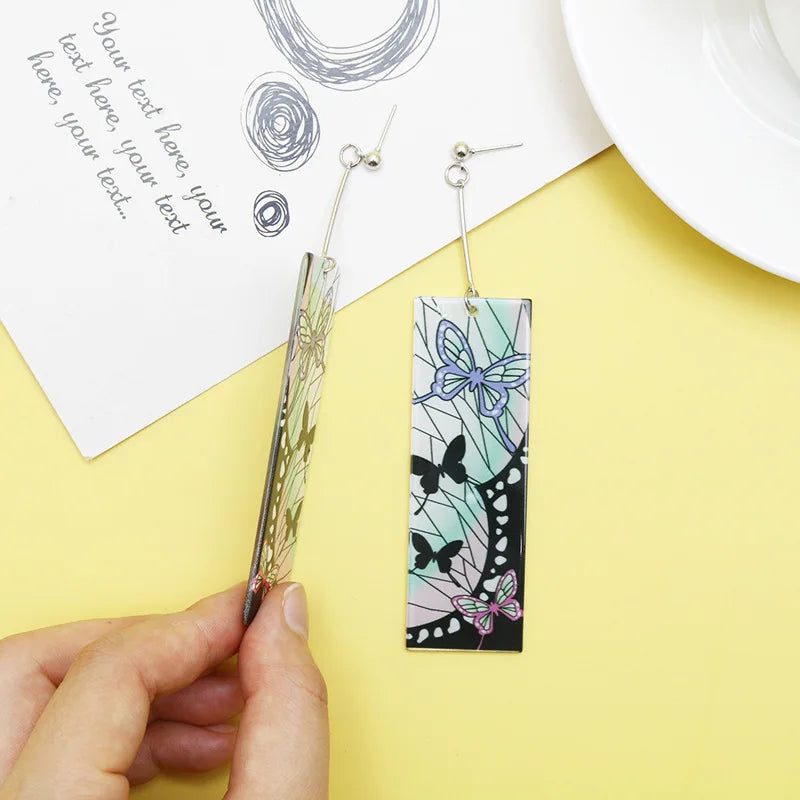 Tanjiro earrings Demon Slayer featuring a colorful butterfly design on a rectangular pendant