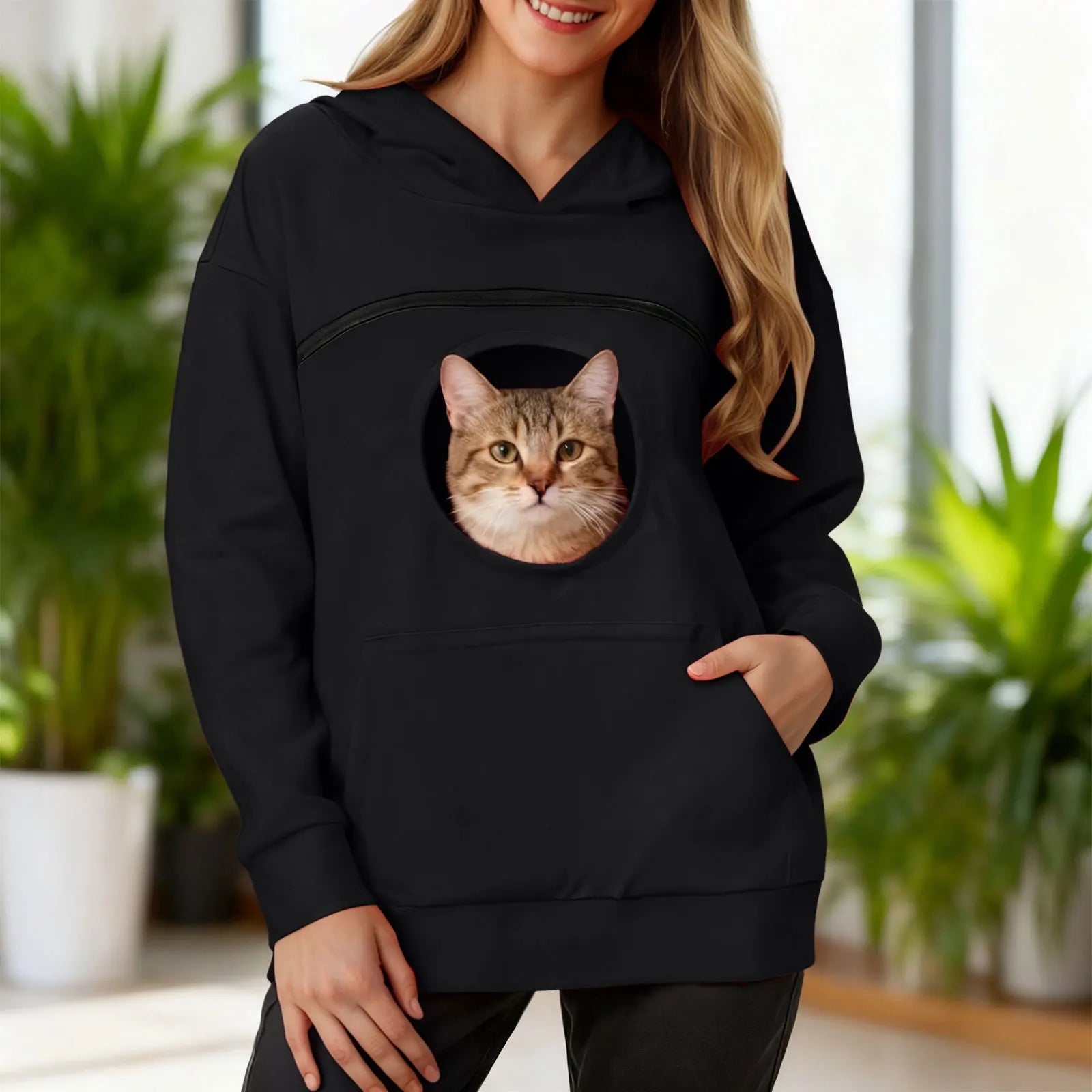 Black women's kangaroo pet hoodie with a circular front pocket for pet comfort