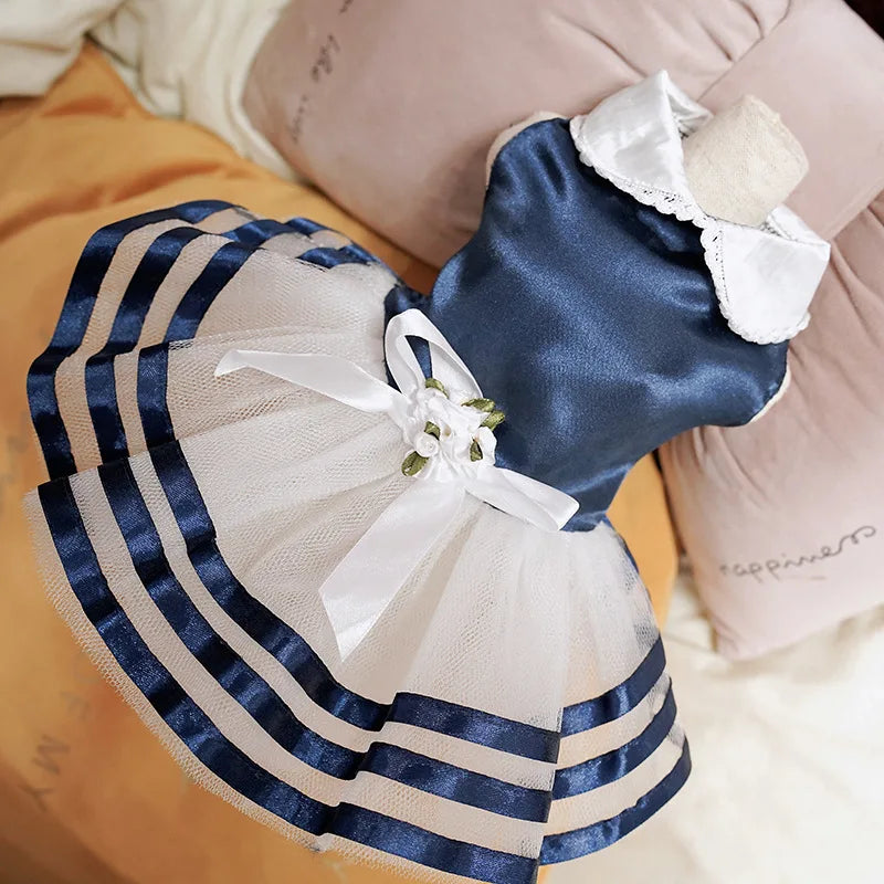 Yorkie summer princess dress in blue and white with a ruffled skirt and bow detail for small dogs
